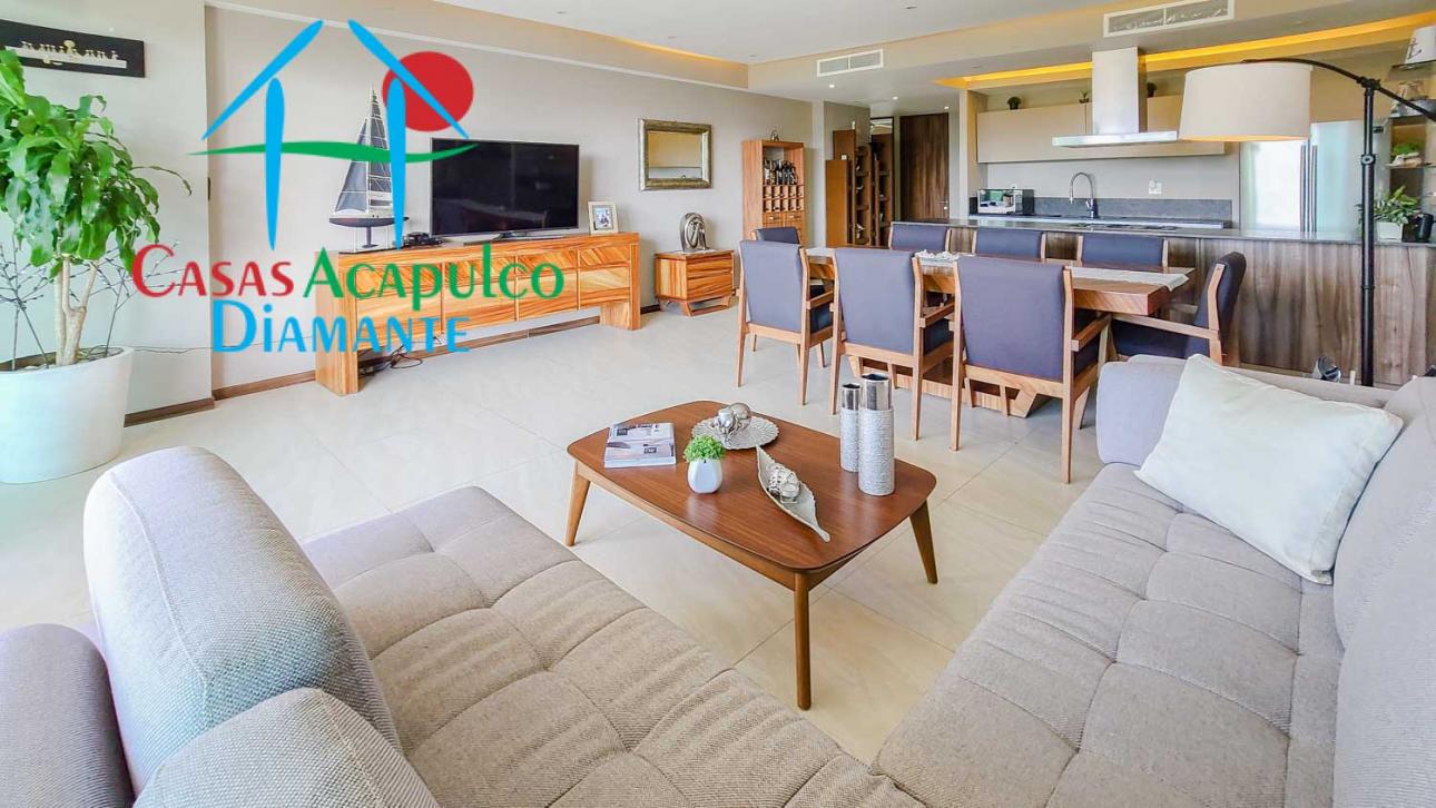 Departamento de playa con terraza y vista a las albercas