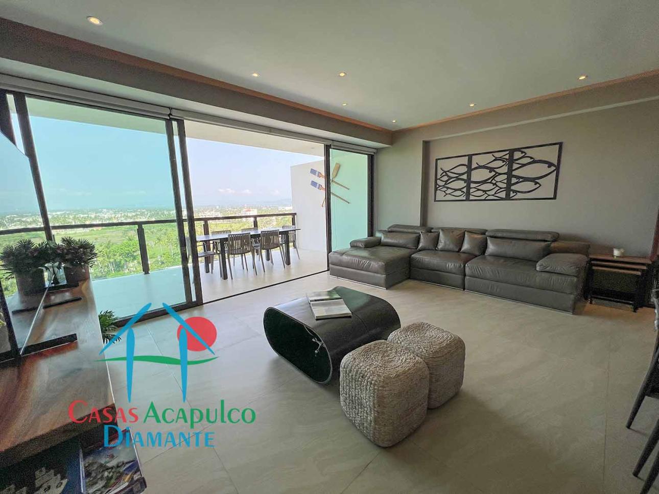 Terraza con vista a las albercas y áreas comunes