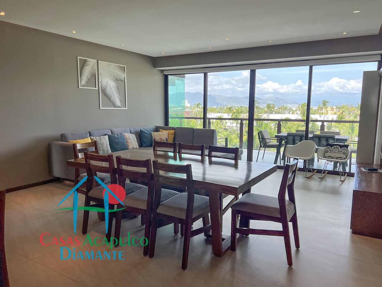 Terraza con vista a las albercas y áreas comunes
