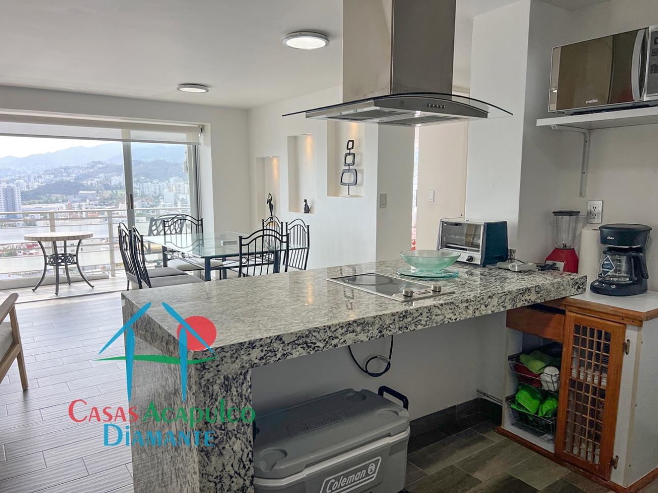 Departamento en piso alto con terraza y vista a la ciudad - 11