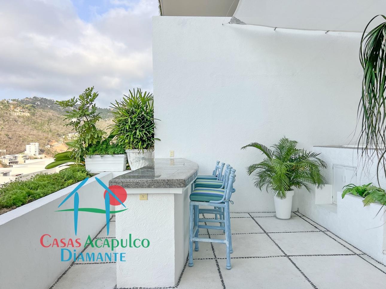 Terraza con jacuzzi y vista a la bahía en Brisas Diamante - 8