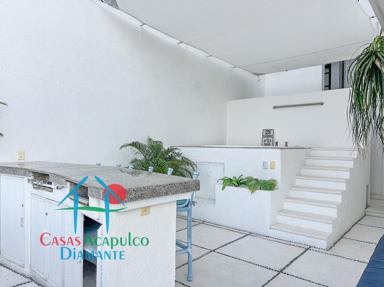 Terraza con jacuzzi y vista a la bahía en Brisas Diamante - 9