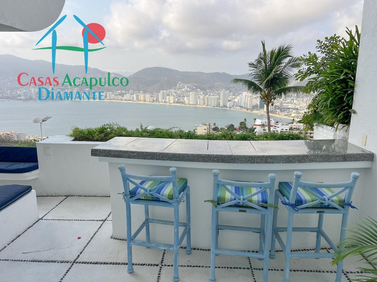 Terraza con jacuzzi y vista a la bahía en Brisas Diamante - 10