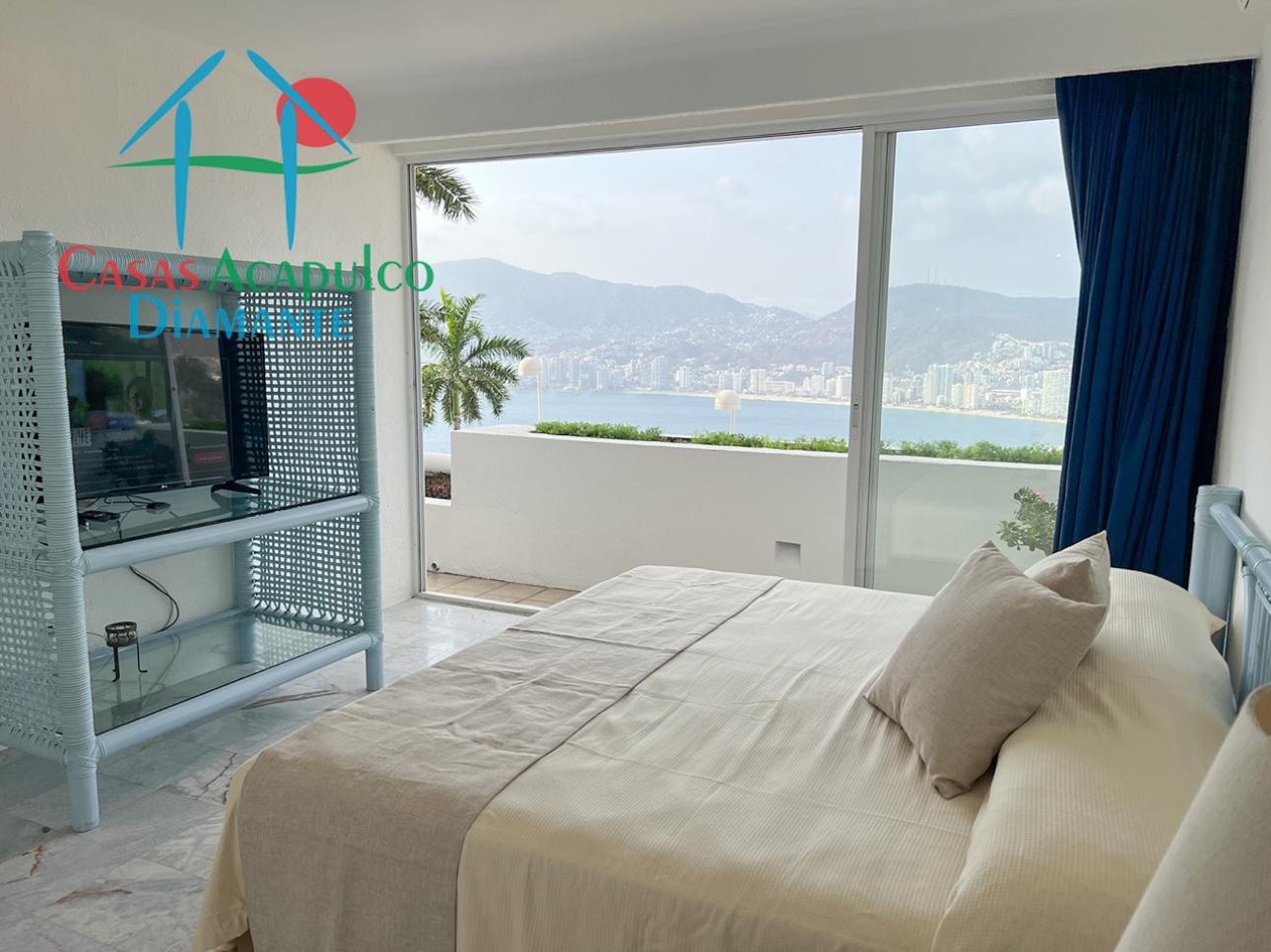 Terraza con jacuzzi y vista a la bahía en Brisas Diamante - 14
