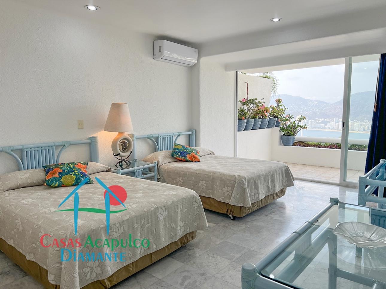 Terraza con jacuzzi y vista a la bahía en Brisas Diamante - 19