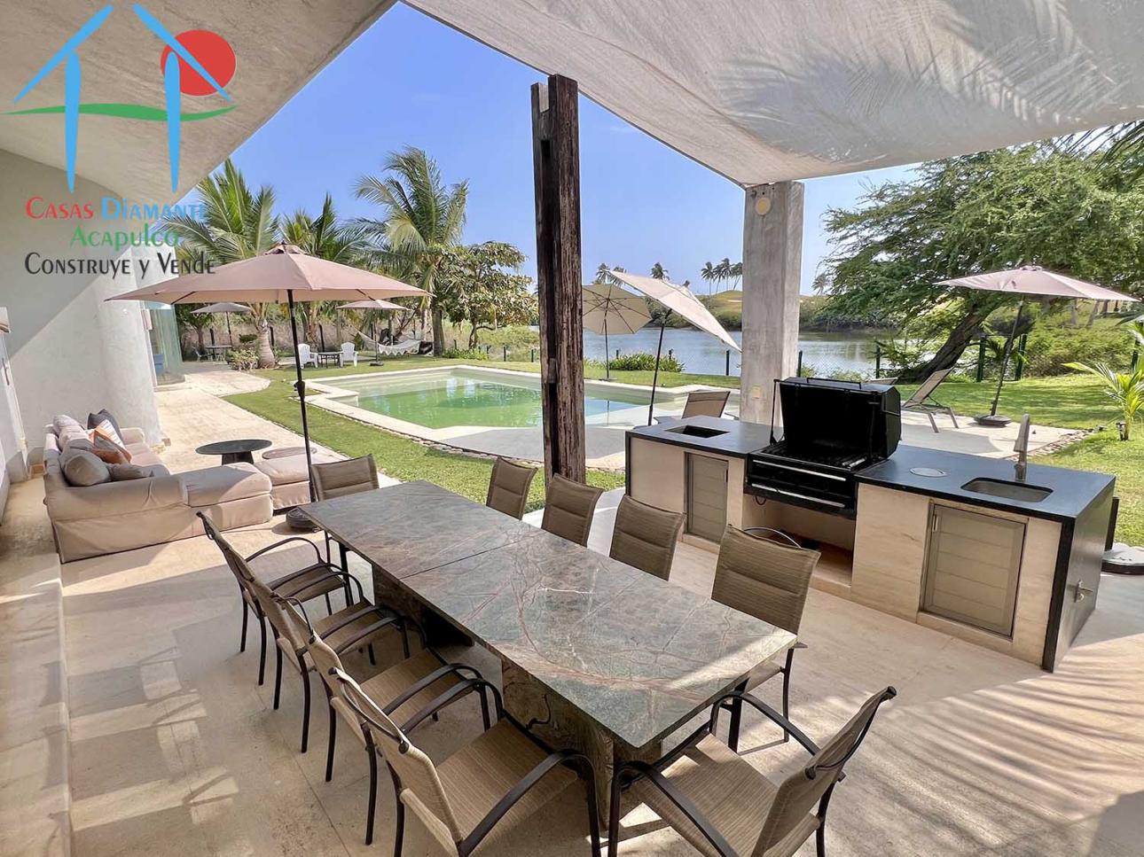 Terraza, vista a la laguna, jardín con alberca y family room — foto 7