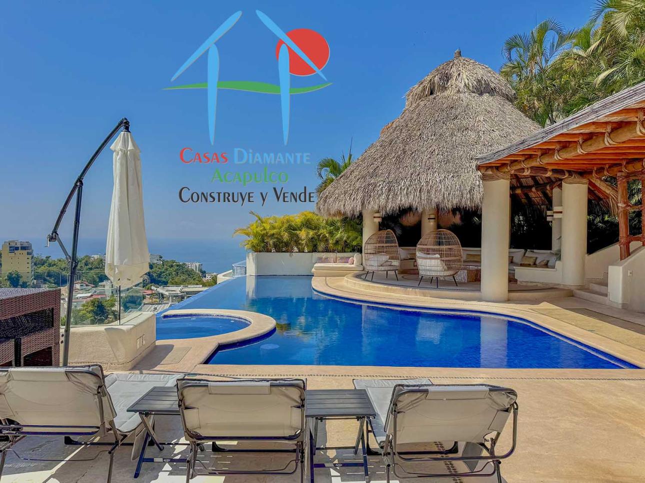 Terraza con asoleadero, alberca, jacuzzi y vista al mar